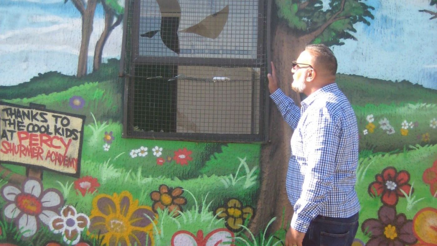 Abdullah inspects the vandalism at the StreetWatch base, Balsall Heath