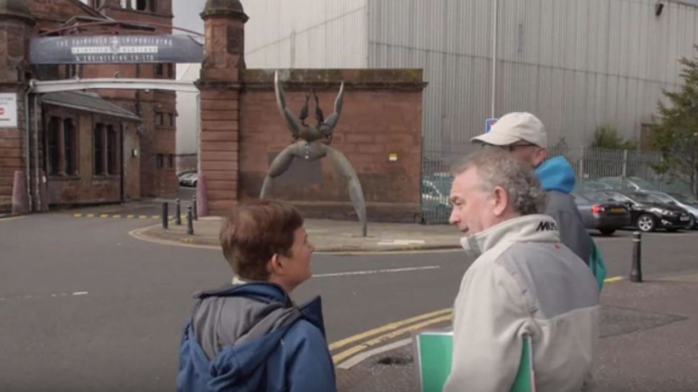 2 people speaking during a govan walkabout
